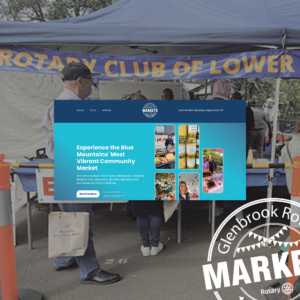 Rotary Club market stall banner, bustling community event